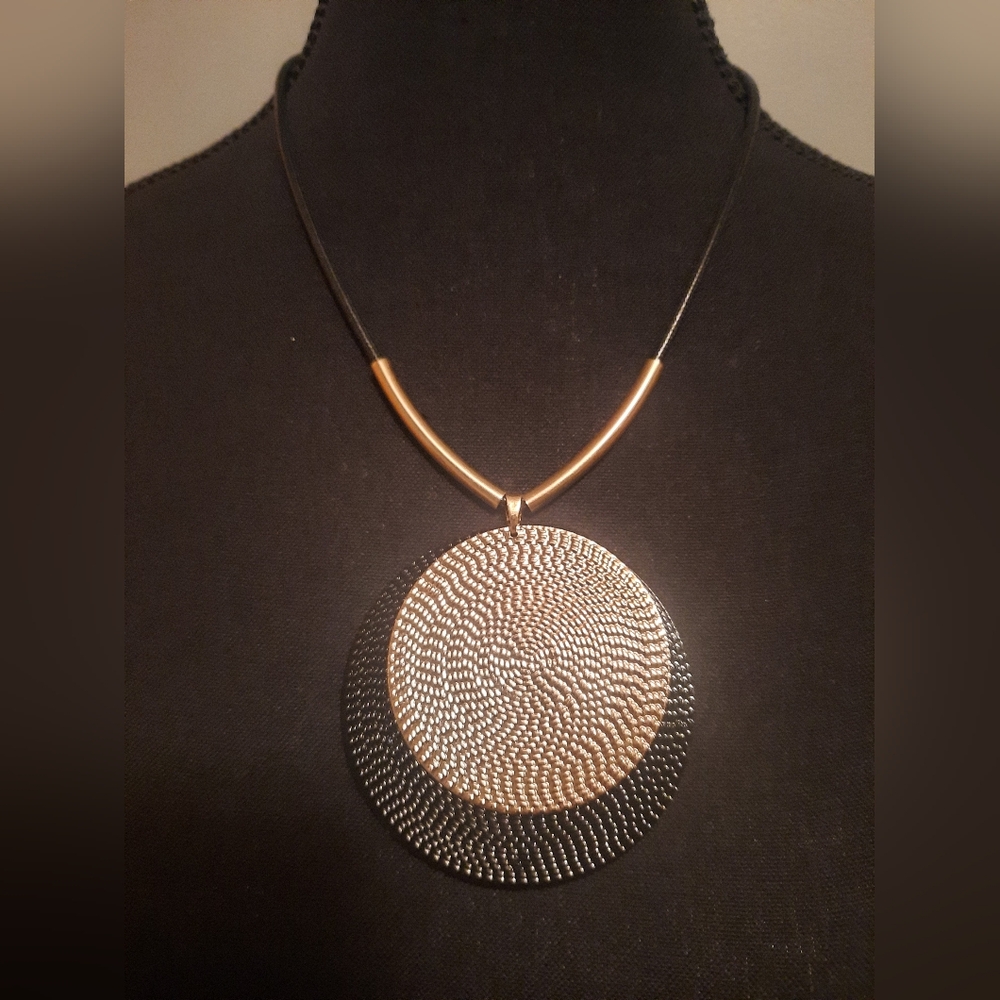 Elegant Gold and Silver Pendant Necklace